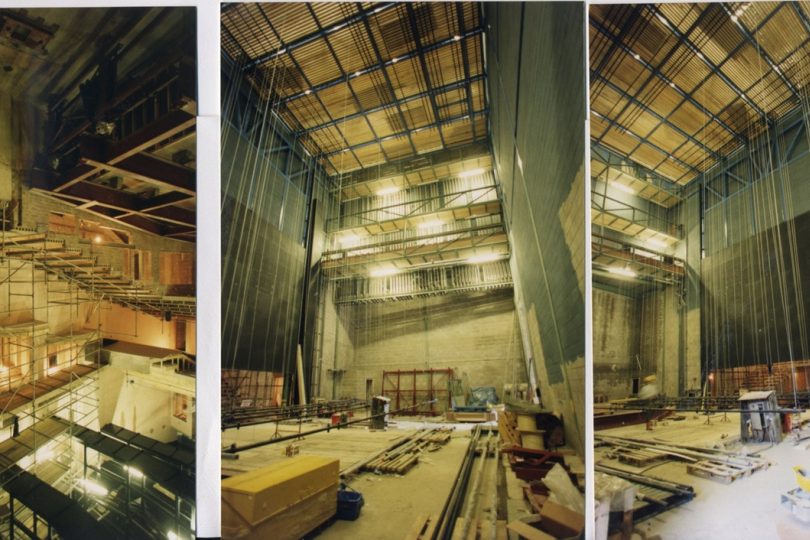Three side-by-side images showing the Millennium Forum theatre under construction, with scaffolding, exposed concrete, construction materials, and high ceilings in various stages of build.