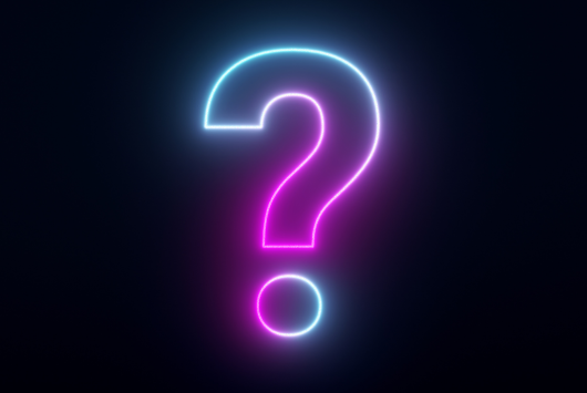 A glowing neon question mark in pink and blue hues against a dark background, symbolising enquiry