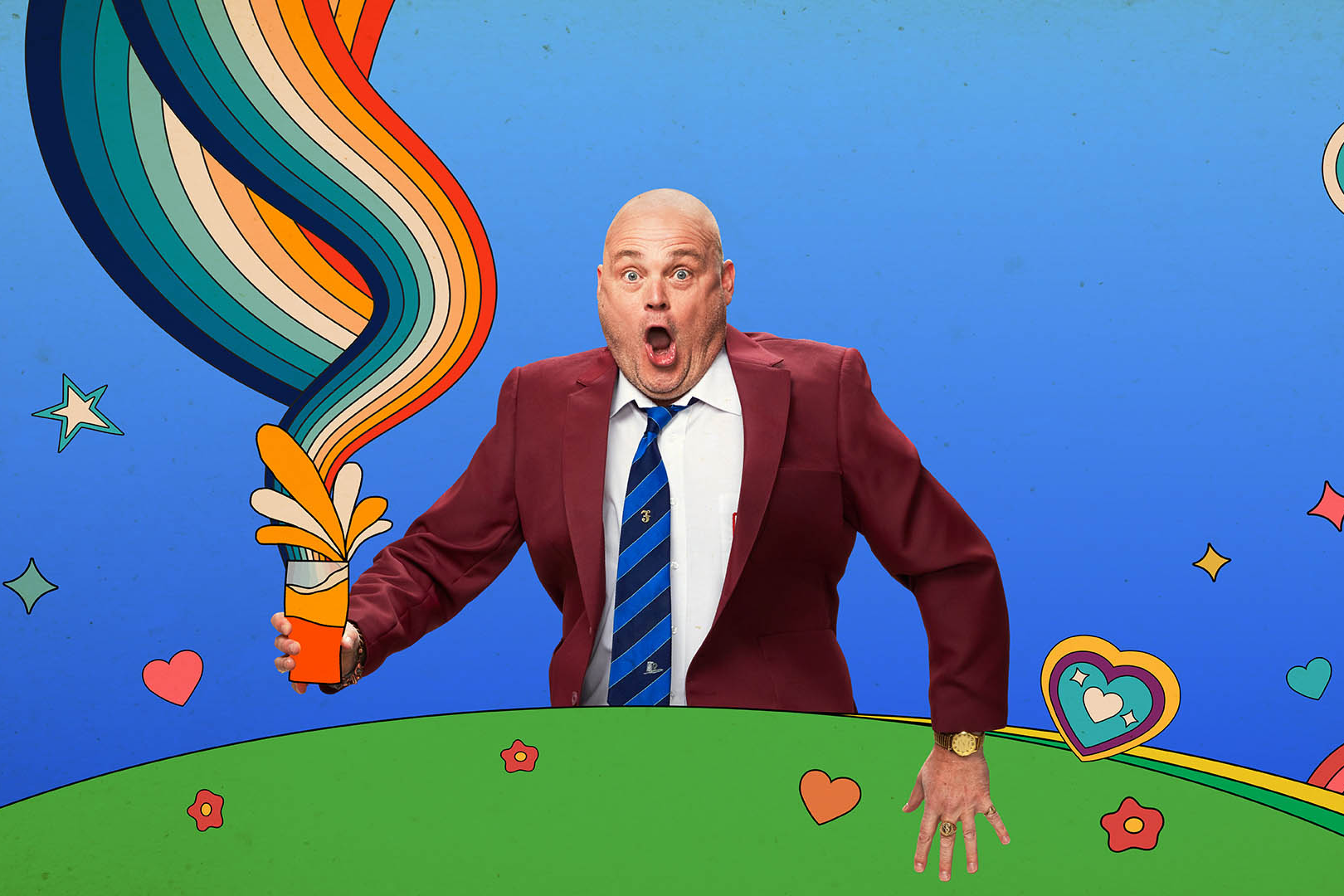 Al Murray in a maroon blazer and striped tie holds a pint with colourful liquid bursting out, set against a cartoon-style background with hearts, stars, and rainbows.